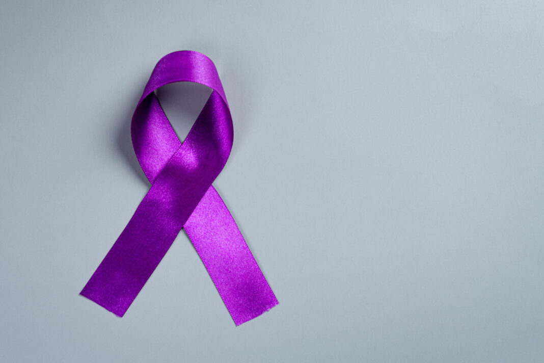 Laço em prol da conscientização da epilepsia, em Março Roxo, mês de conscientização sobre a doença - Imagem: jcomp via Freepik